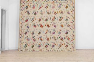 A suzani-inspired flat-weave wool rug,