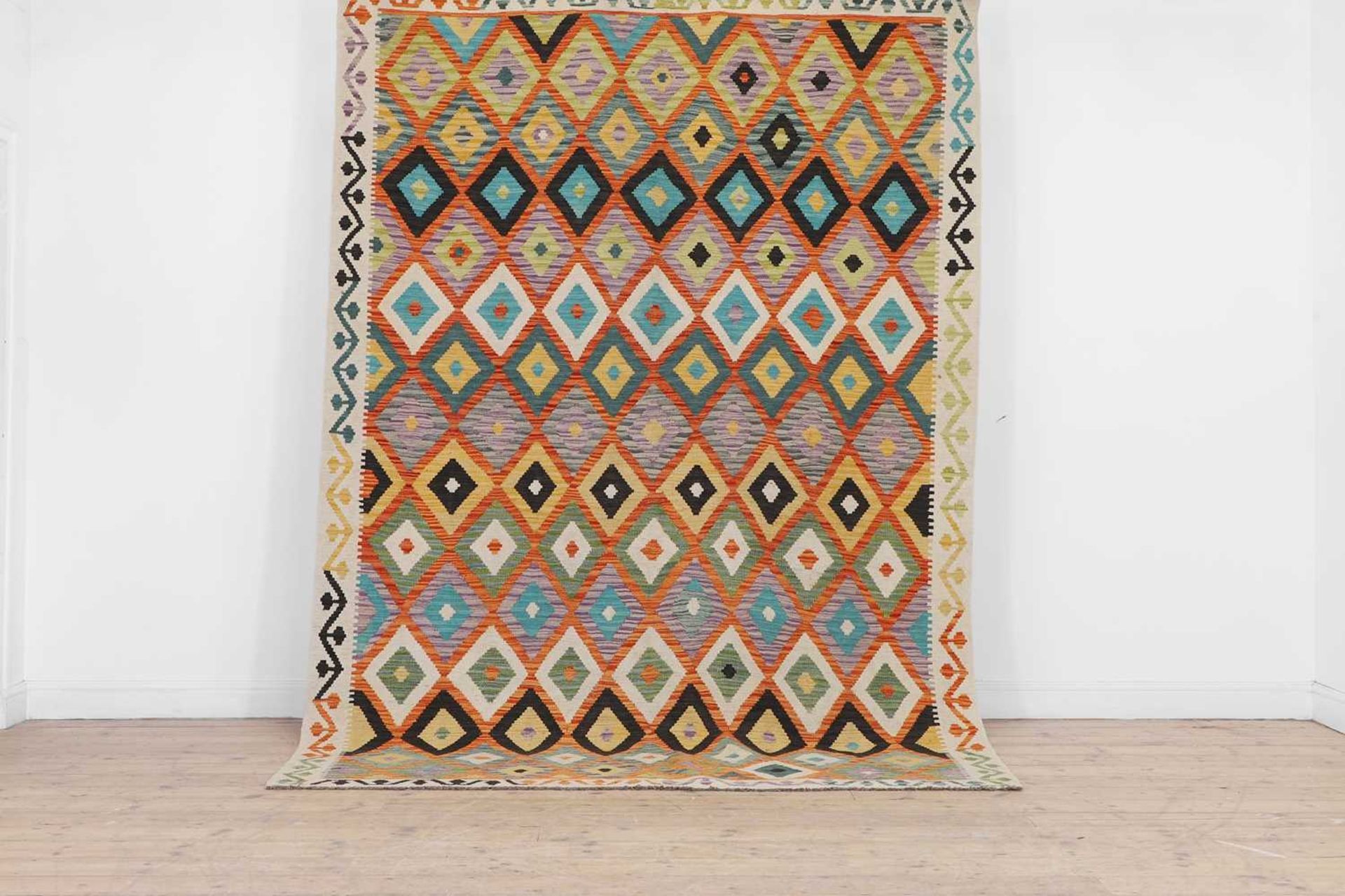 A kilim flat-weave rug,