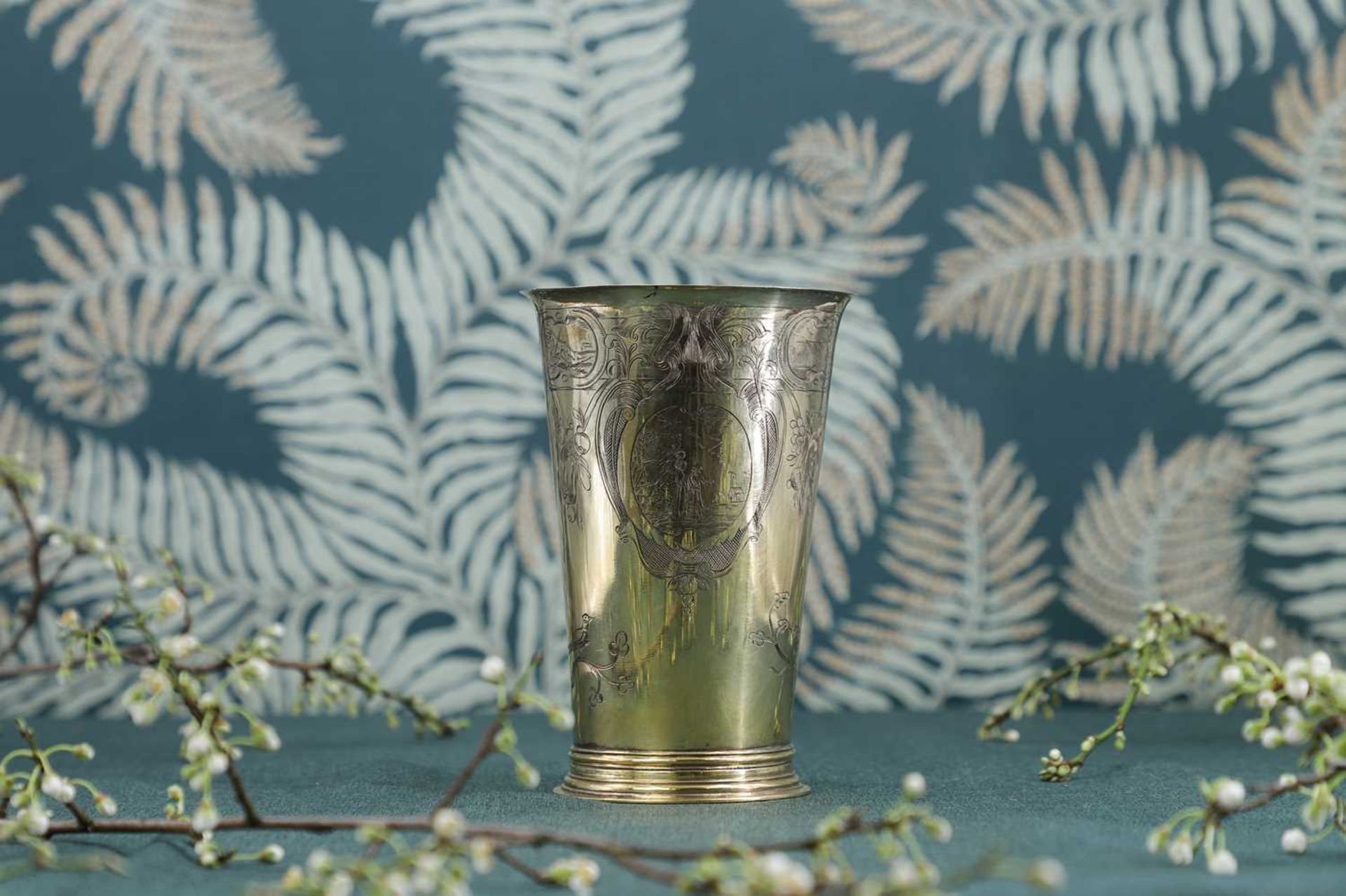 A Dutch-style silver-gilt beaker,