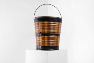 A fruitwood and ebonised peat bucket,