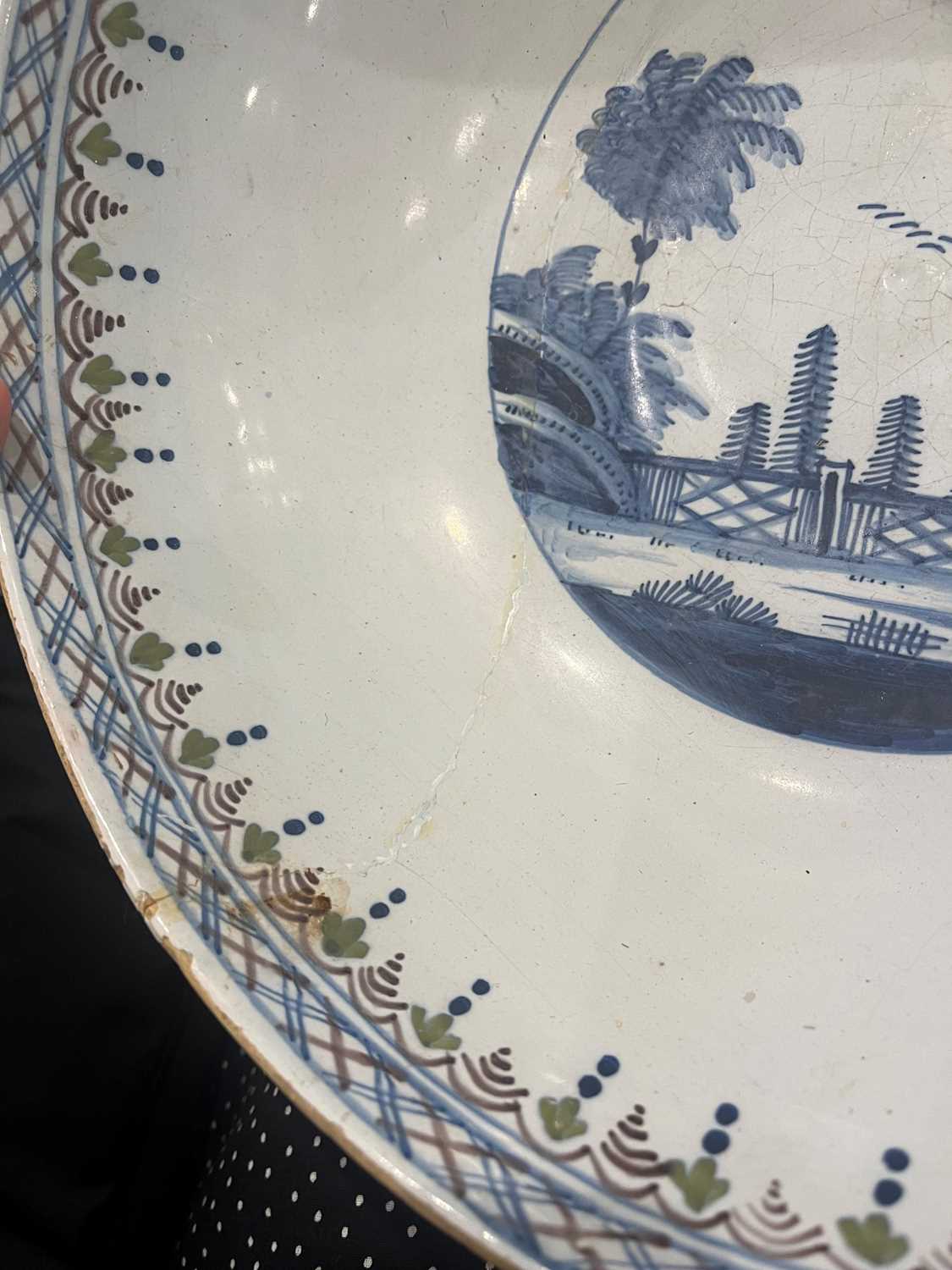 A delftware tin-glazed earthenware punchbowl, - Image 17 of 21