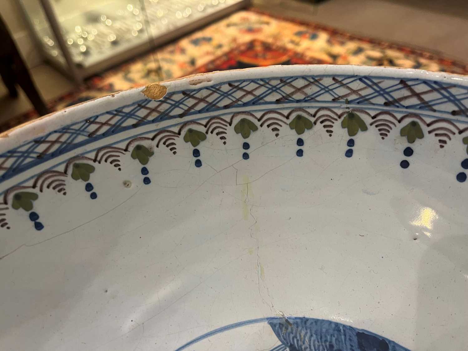 A delftware tin-glazed earthenware punchbowl, - Image 12 of 21