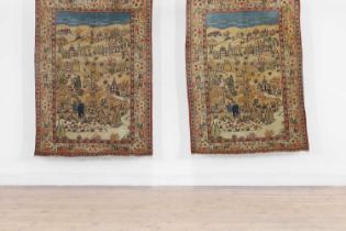 A pair of Kashan pictorial wool rugs,