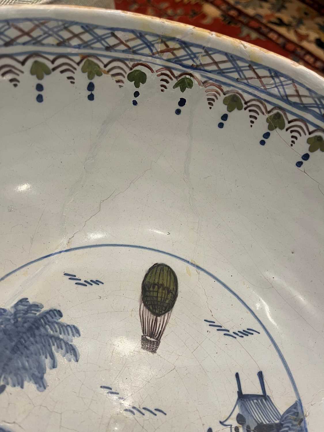 A delftware tin-glazed earthenware punchbowl, - Image 15 of 21