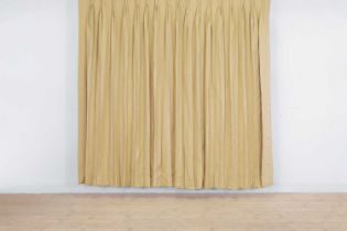 A pair of pale gold striped silk curtains,