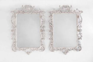 A pair of George III-style painted wooden mirrors,