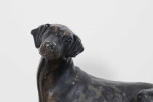 A painted stoneware figure of a Dobermann dog,