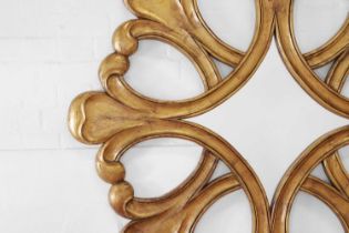 A large Hollywood Regency giltwood mirror,