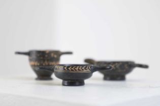 A group of three Gnathian ware miniature pottery vessels,