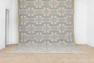 A flat-weave wool carpet of Scandinavian design,