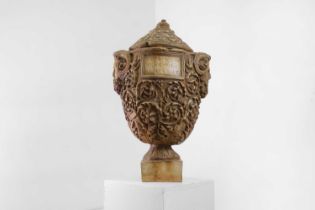 A grand tour painted earthenware burial urn,