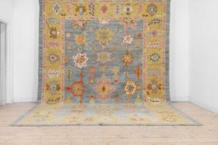 An Oushak wool carpet,