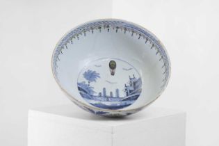 A delftware tin-glazed earthenware punchbowl,