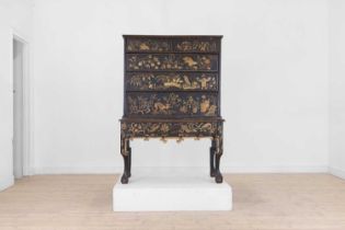 A black lacquer and gilt-japanned chest on stand,