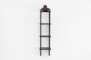 A set of Regency-style chinoiserie hanging shelves,