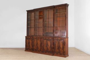 A flame mahogany library bookcase,