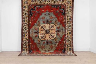 A wool carpet of Serapi design,