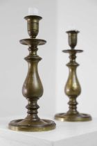 A pair of brass candlesticks,