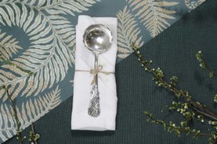 A small George II silver naturalistic ladle,