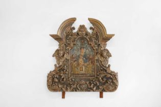A carved and painted altarpiece,