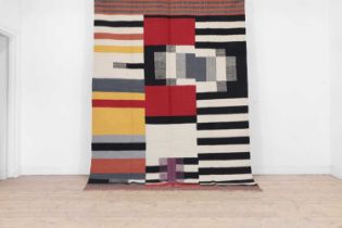 A contemporary Bauhaus-inspired flat-weave carpet,