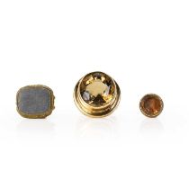 A 9ct gold smoky quartz ring and two base metal fobs,