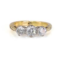 A gold three stone diamond hinged shank ring,