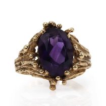 An abstract design amethyst ring,