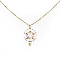 An Edwardian gold peridot, split pearl drop pendant and chain,