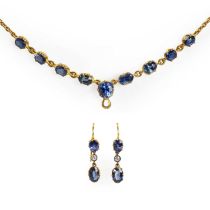 A late Victorian sapphire necklace and a matched pair of sapphire and diamond drop earrings,