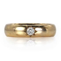 A 9ct gold diamond wedding ring,