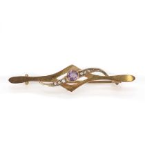 An Edwardian gold amethyst and split pearl set bar brooch,