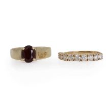 Two gold gem set rings,