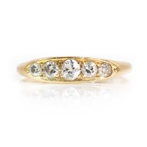 A gold five stone diamond boat shaped ring,
