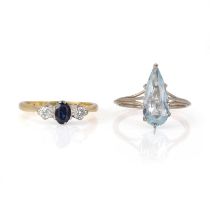 A white gold aquamarine ring and a gold sapphire and diamond ring,