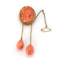 A coral cameo negligee brooch,