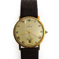 An 18ct gold Corum automatic strap watch,