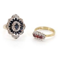 An 18ct gold ruby and diamond ring and a 9ct gold sapphire cluster ring,
