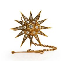 An Edwardian gold split pearl and diamond starburst brooch,