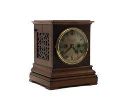 A mahogany W. E. Moser patent mantel clock,