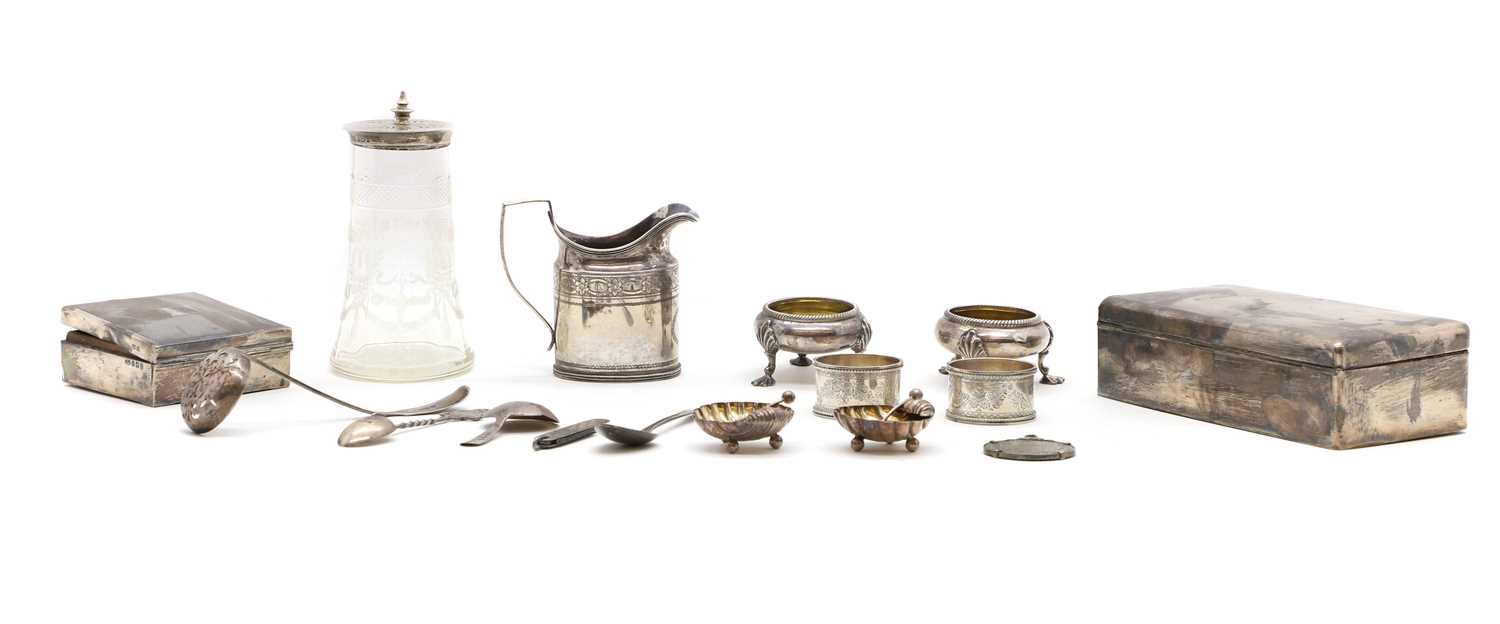 A group of silver items