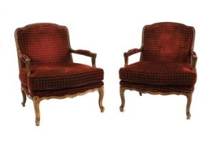 A pair of French Louis XV style fauteuils,