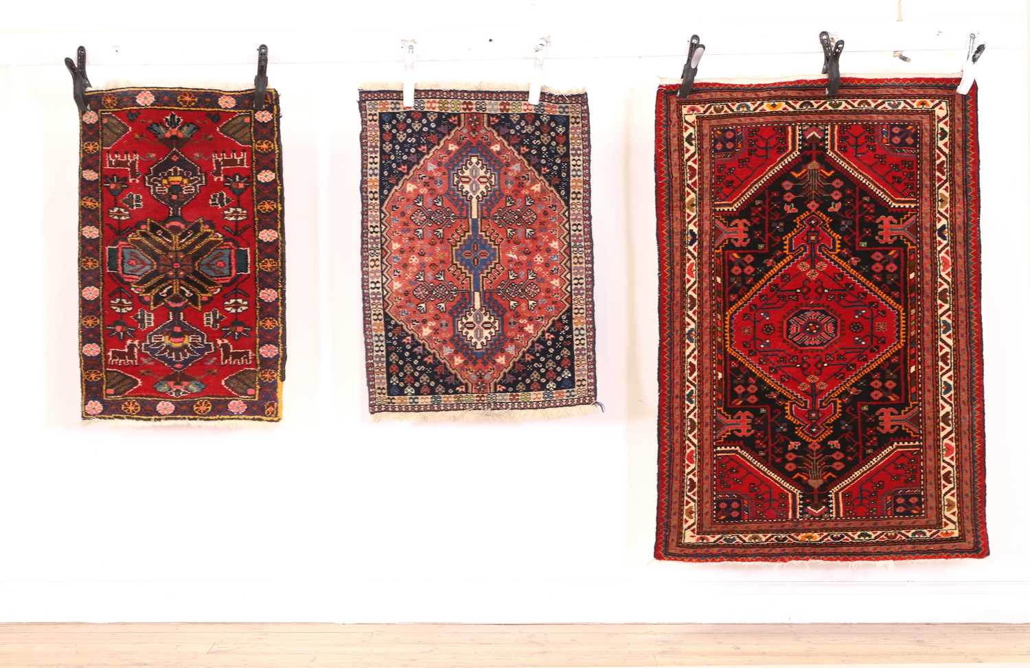 Three Persian rugs,