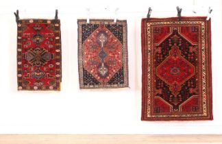 Three Persian rugs,