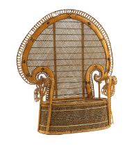 Two large wicker peacock chairs,