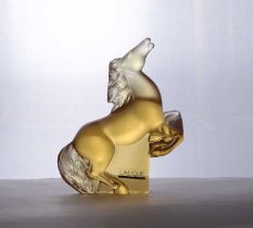 A Lalique amber glass 'Kazak' horse