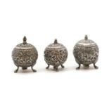 A near pair of Indian silver pepperettes,