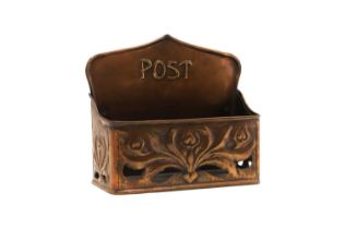 A copper post box,