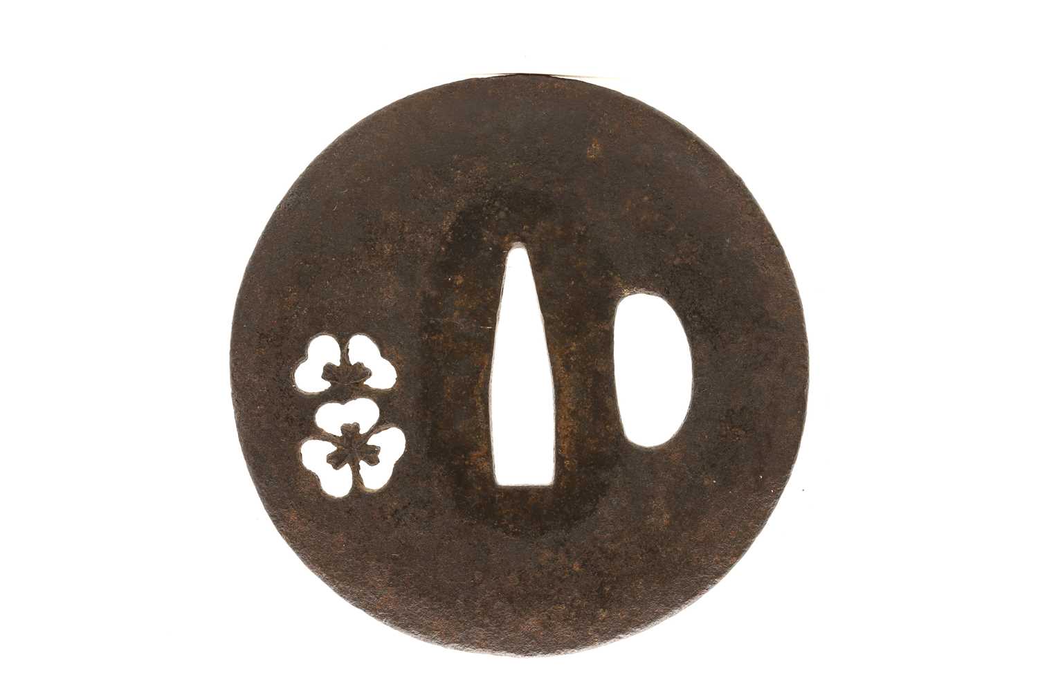 A Japanese Tosho School iron tsuba,