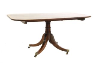 A Regency mahogany pedestal supper table,